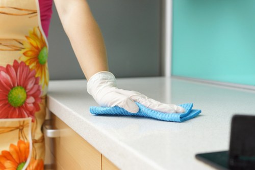 Office cleaning team preparing a professional workspace in W1J