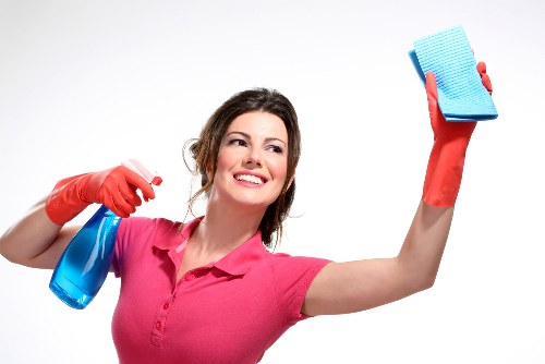 Professional cleaner maintaining a central London office in W1J